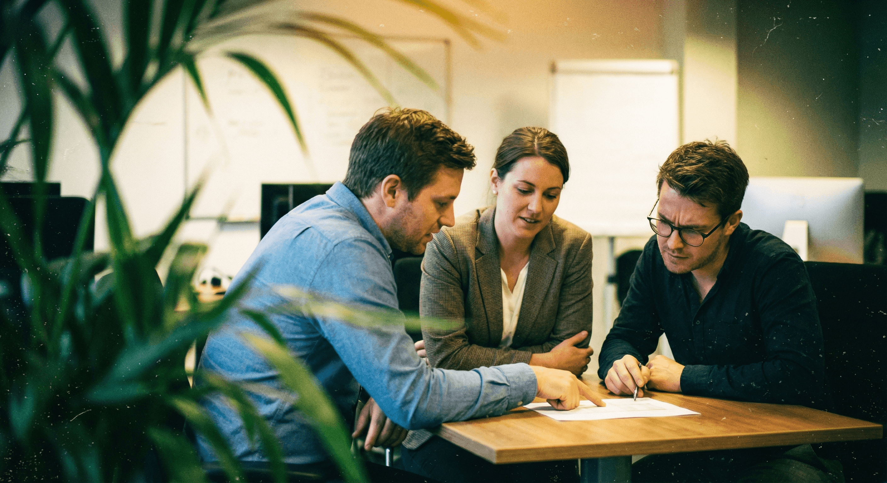 Team collaborating at a table